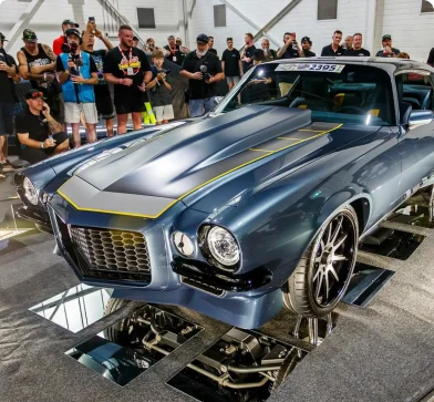 Modified classic blue muscle car showcasing custom SLA 3D printed auto parts.